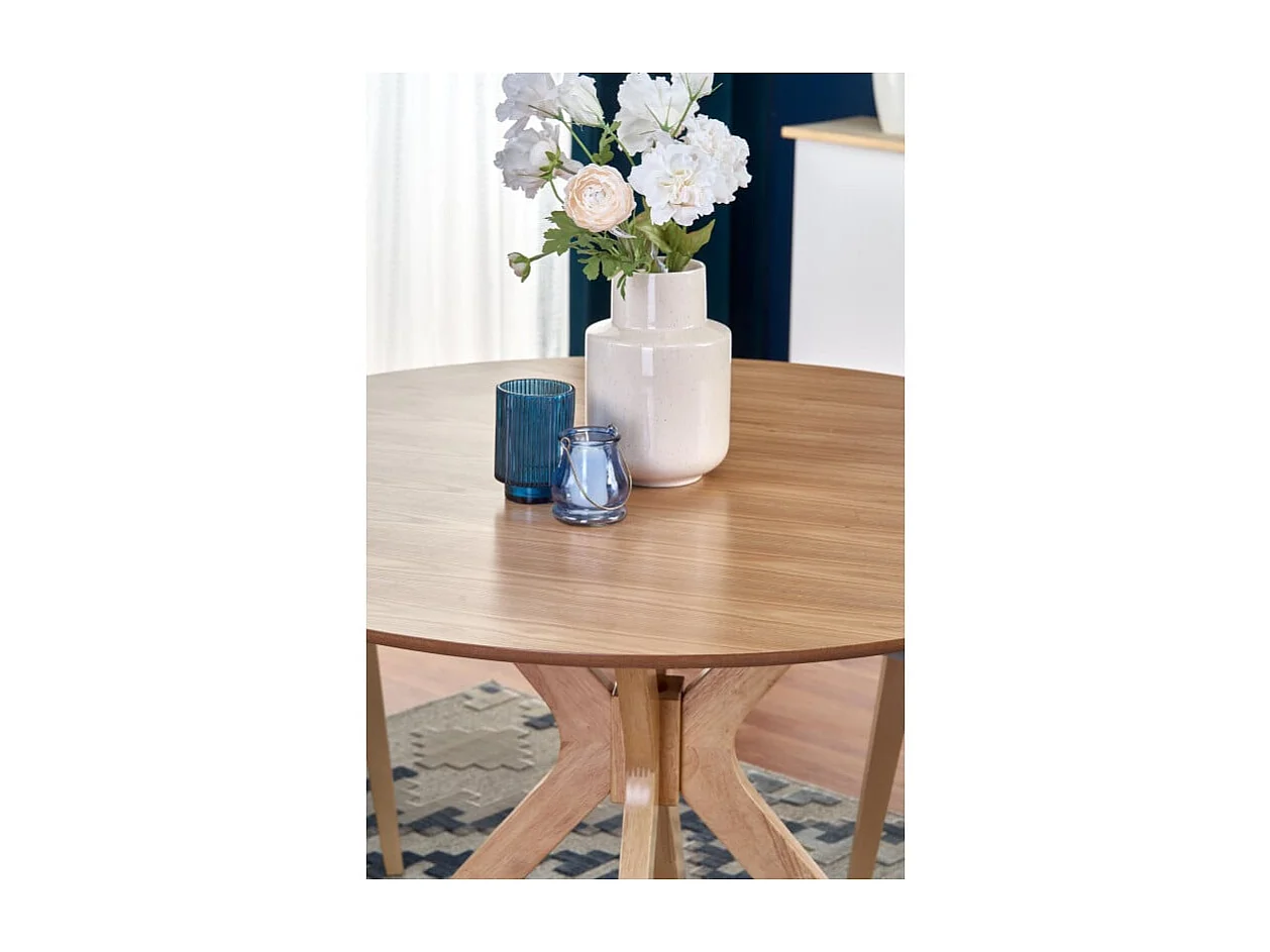 Tavolo da pranzo rotondo con gambe in legno massiccio e piano impiallacciato in rovere naturale Racoon