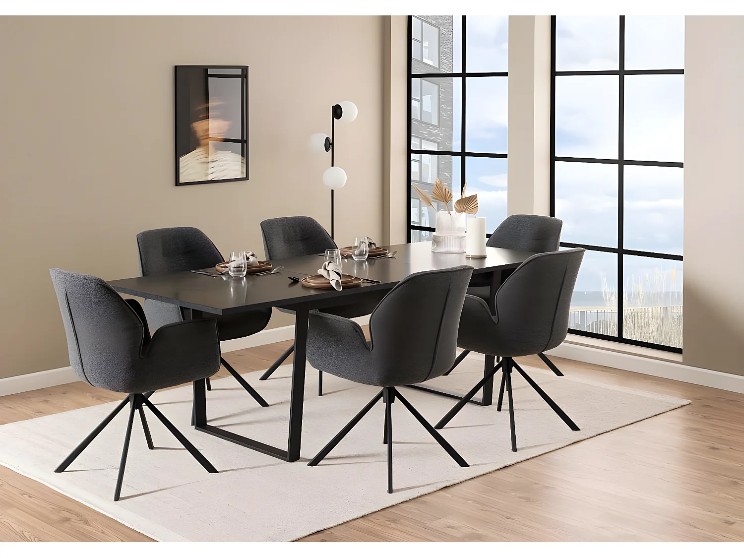 Aura Esszimmerstuhl mit Armlehne grau.