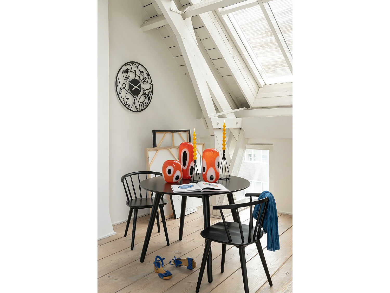 Horloge Murale en Métal "Visages" 49cm Noir