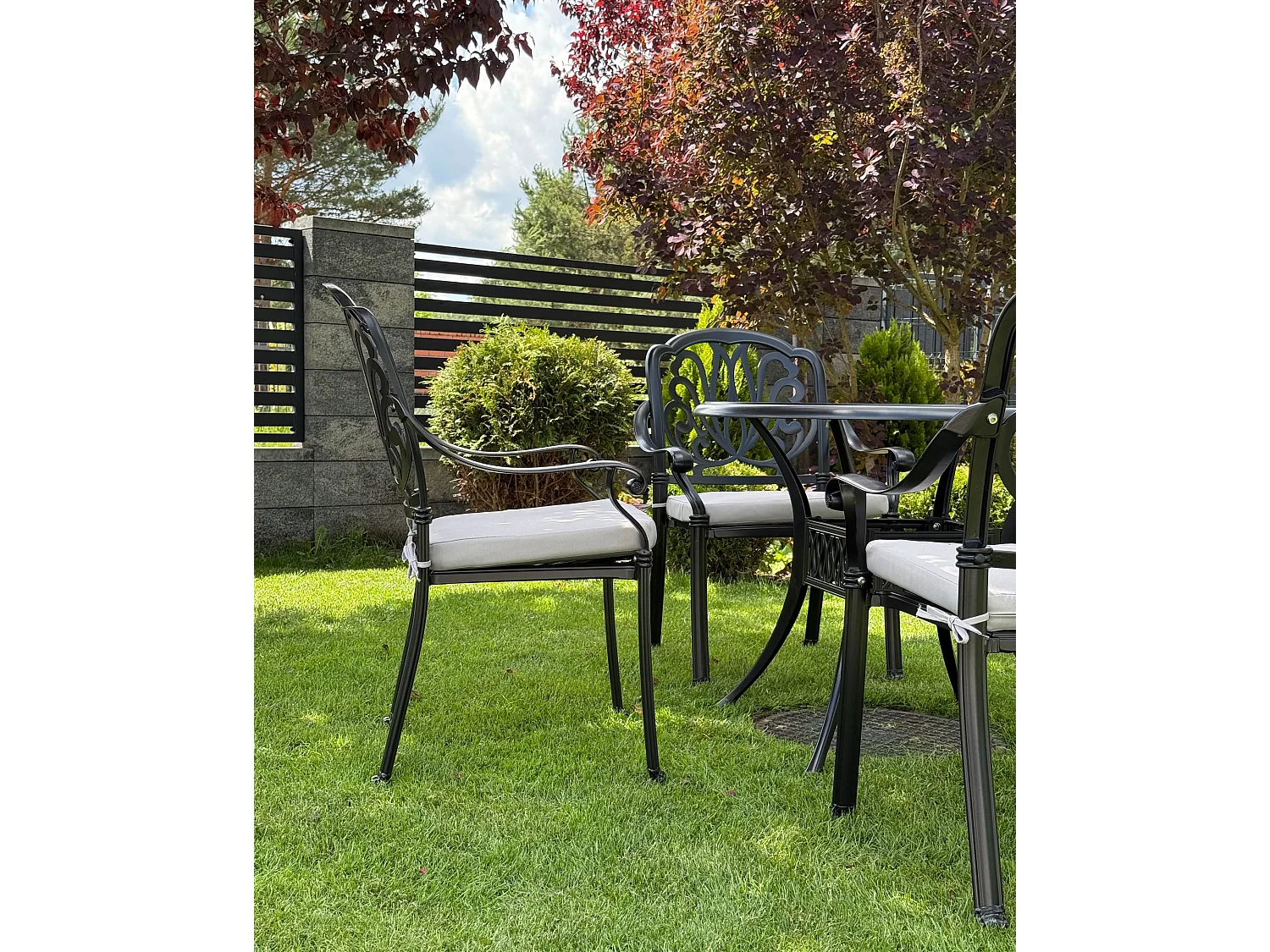 Salle à manger de jardin 4 places ANCONA avec coussins Métal Noir