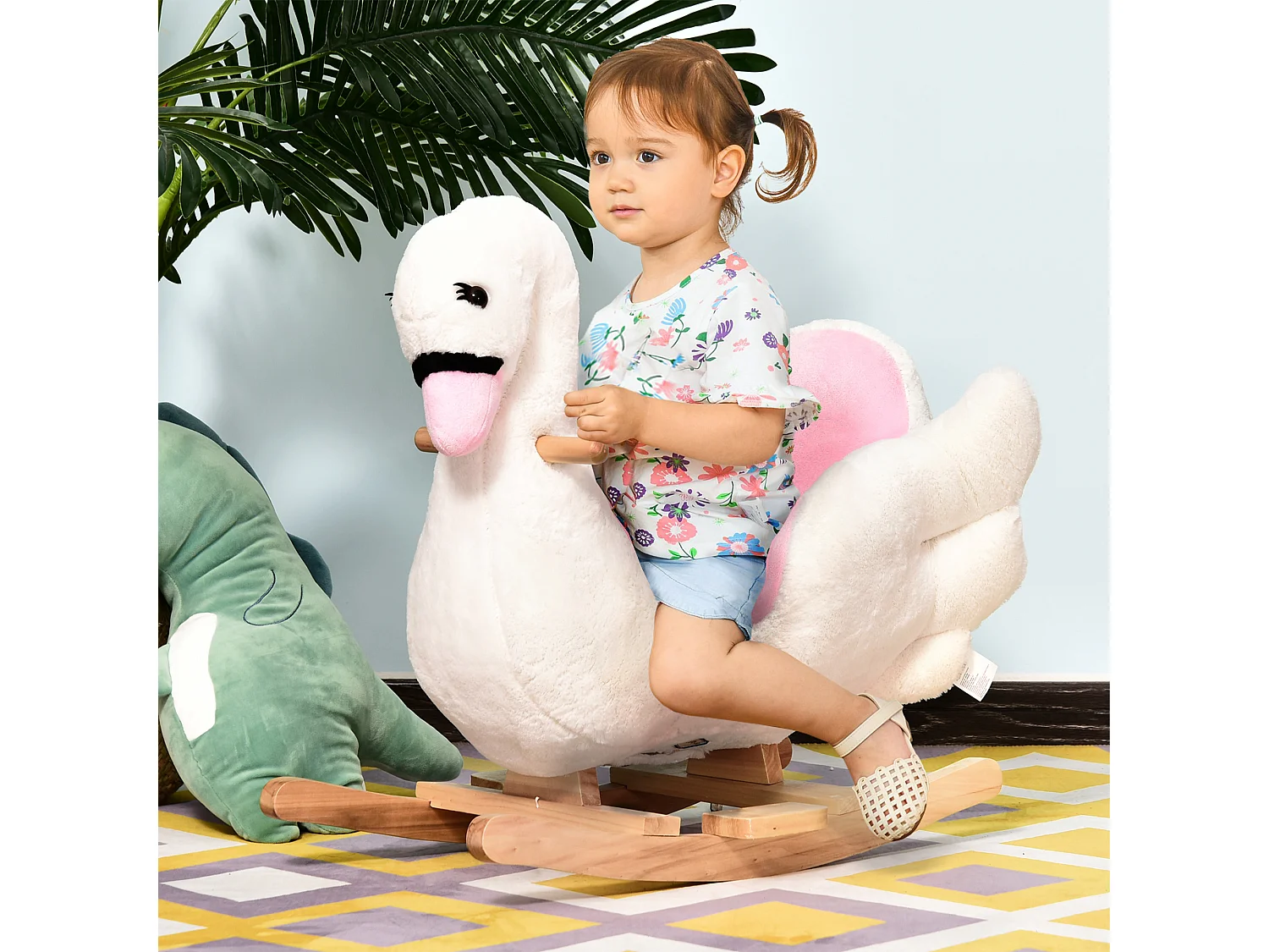 Cheval à bascule modèle cygne fonction musicale assise enveloppante cale-pieds bois peluche douce blanc rose