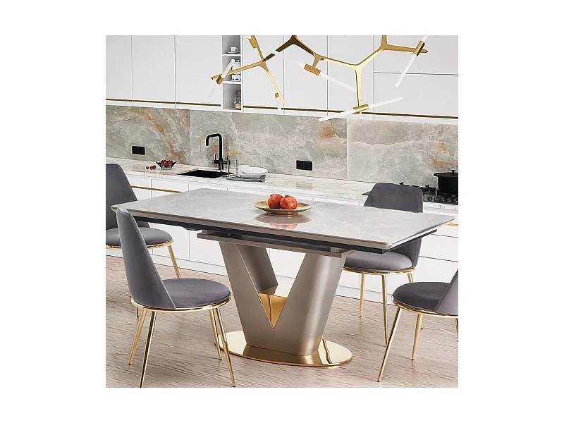 Table extensible avec plateau aspect marbre et piètement design gris et doré EAGLE