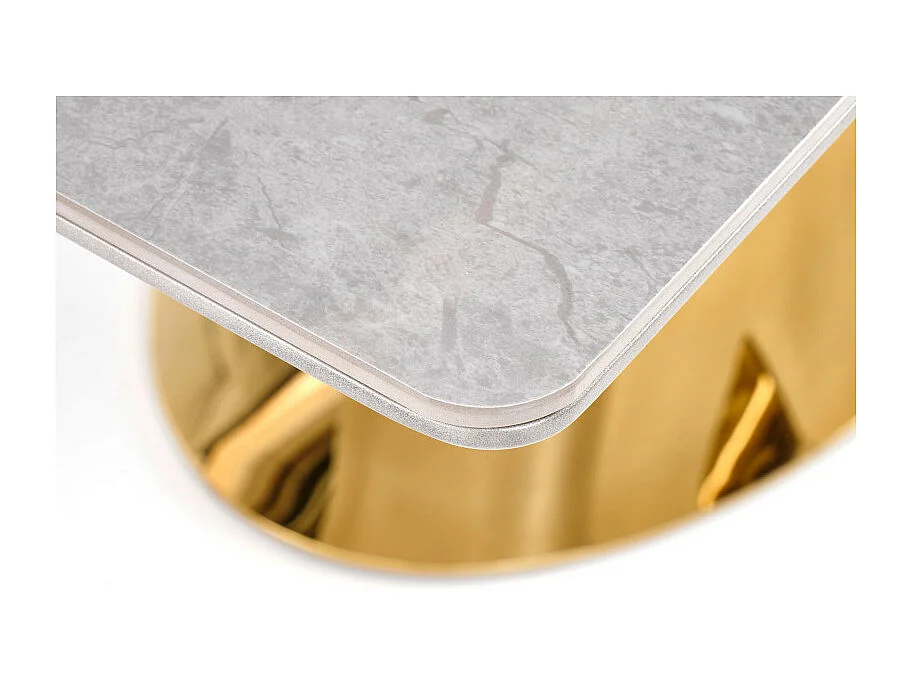Table extensible avec plateau aspect marbre et piètement design gris et doré EAGLE