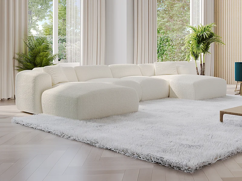 Stor panoramisk hjørnesofa i hvidt bouclé stof POGNI fra Maison Céphy