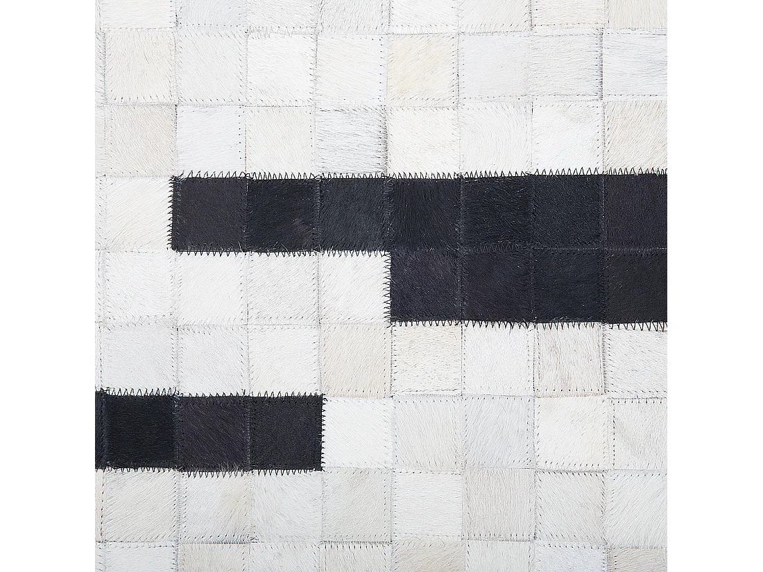 Moderner Teppich schwarz/weiß Echtleder 160 x 230 cm handgefertigt Bolu