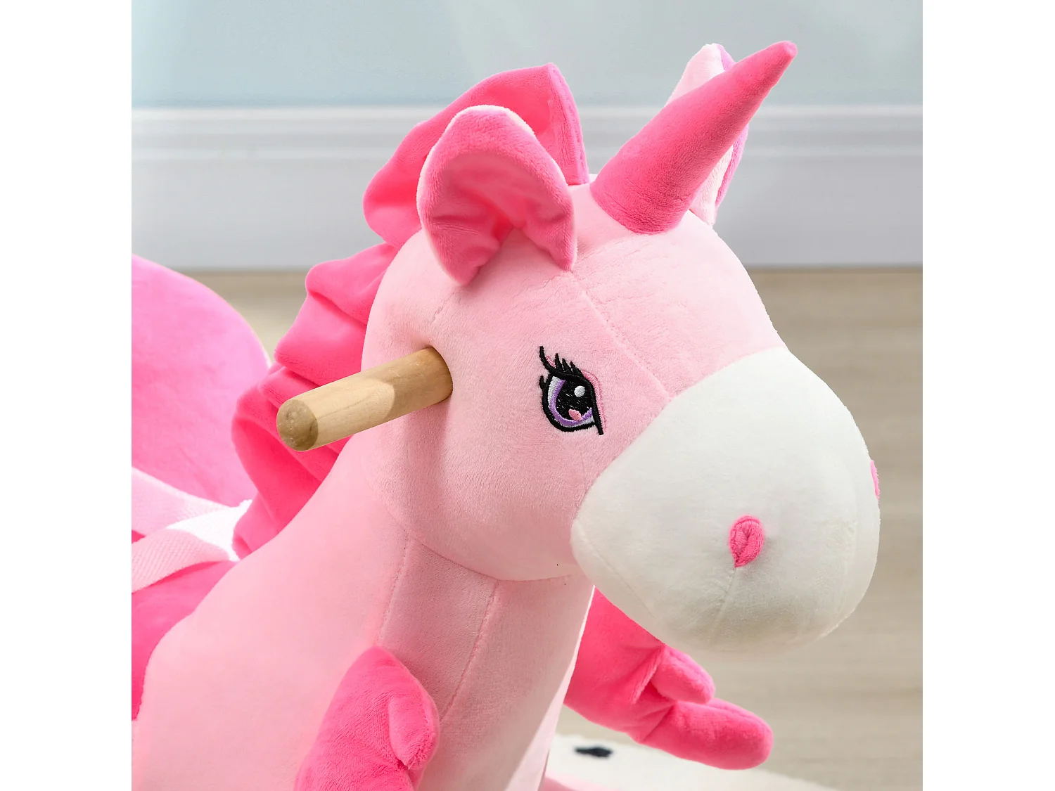 Caballito balancín rosa 65x35x45 cm HOMCOM