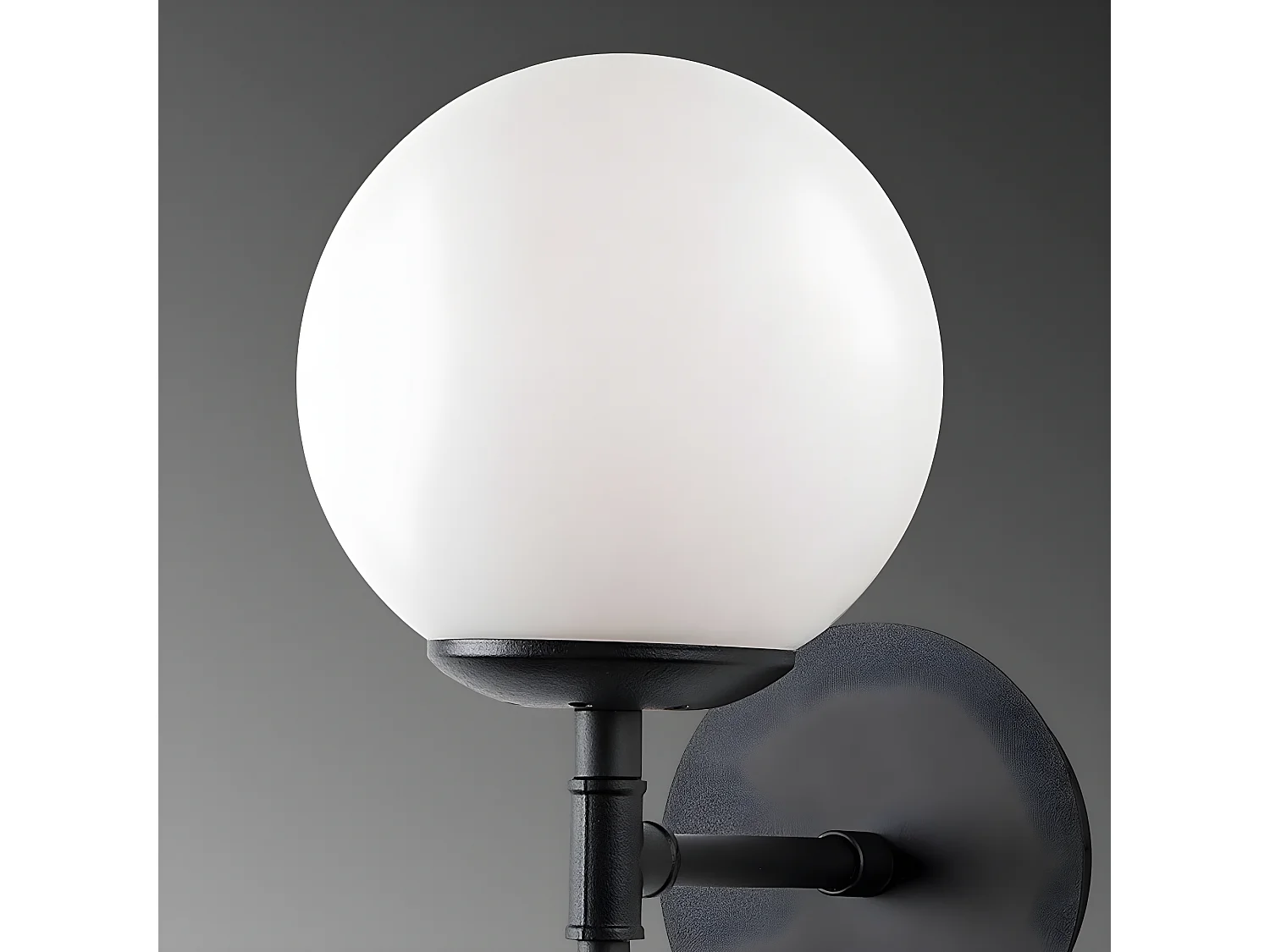 Applique Garet avec structure verticale en métal noir et sphère en verre 1xE27