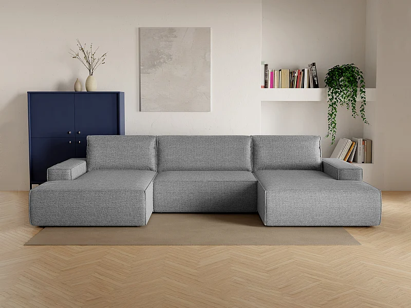 Stor hjørnesofa i panoramaformat med sovesofa i grå, struktureret stofbetræk AMELIA