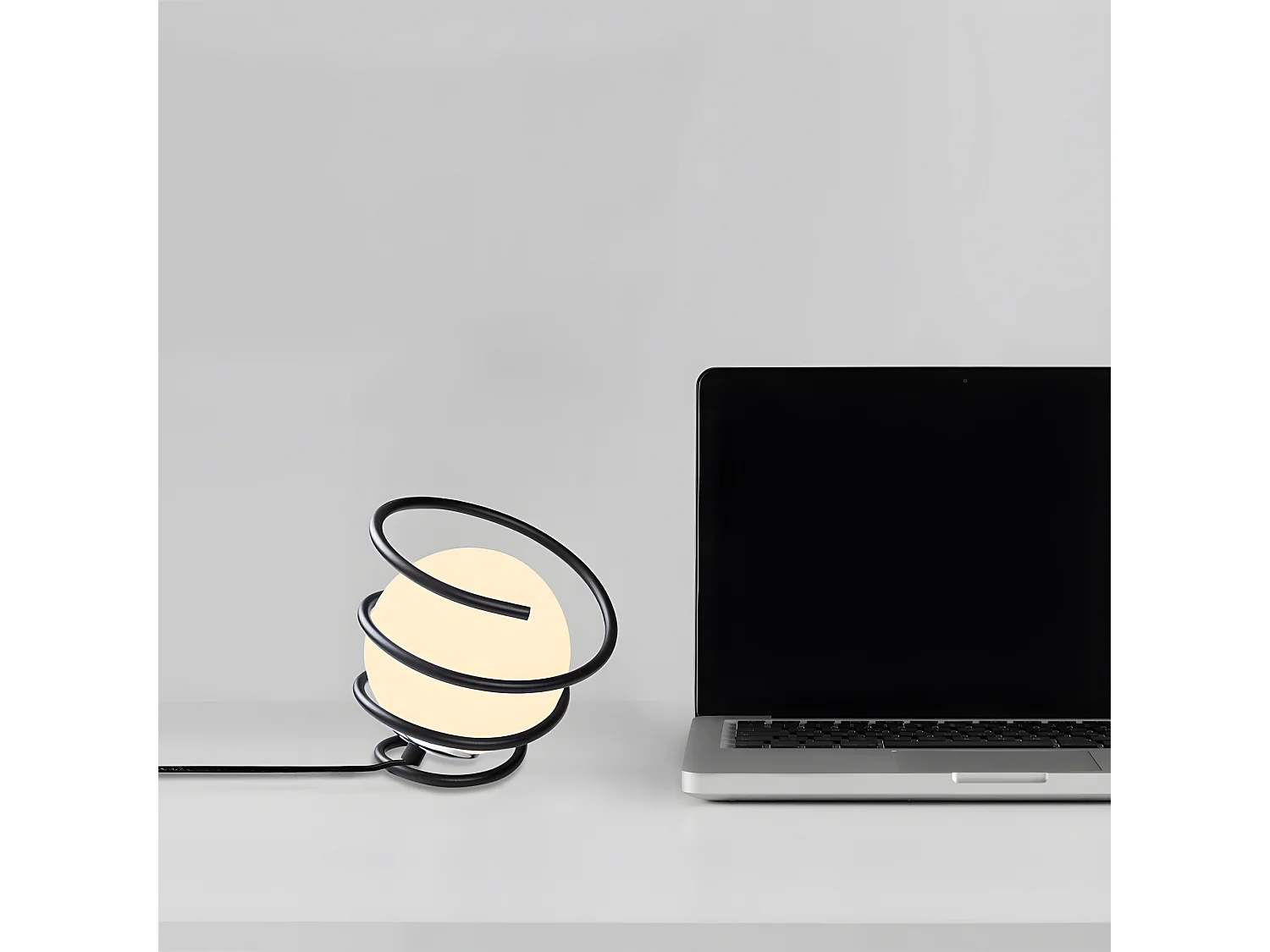 Lampe à poser Galene avec structure en spirale et sphère en verre 1xE27 - Noir