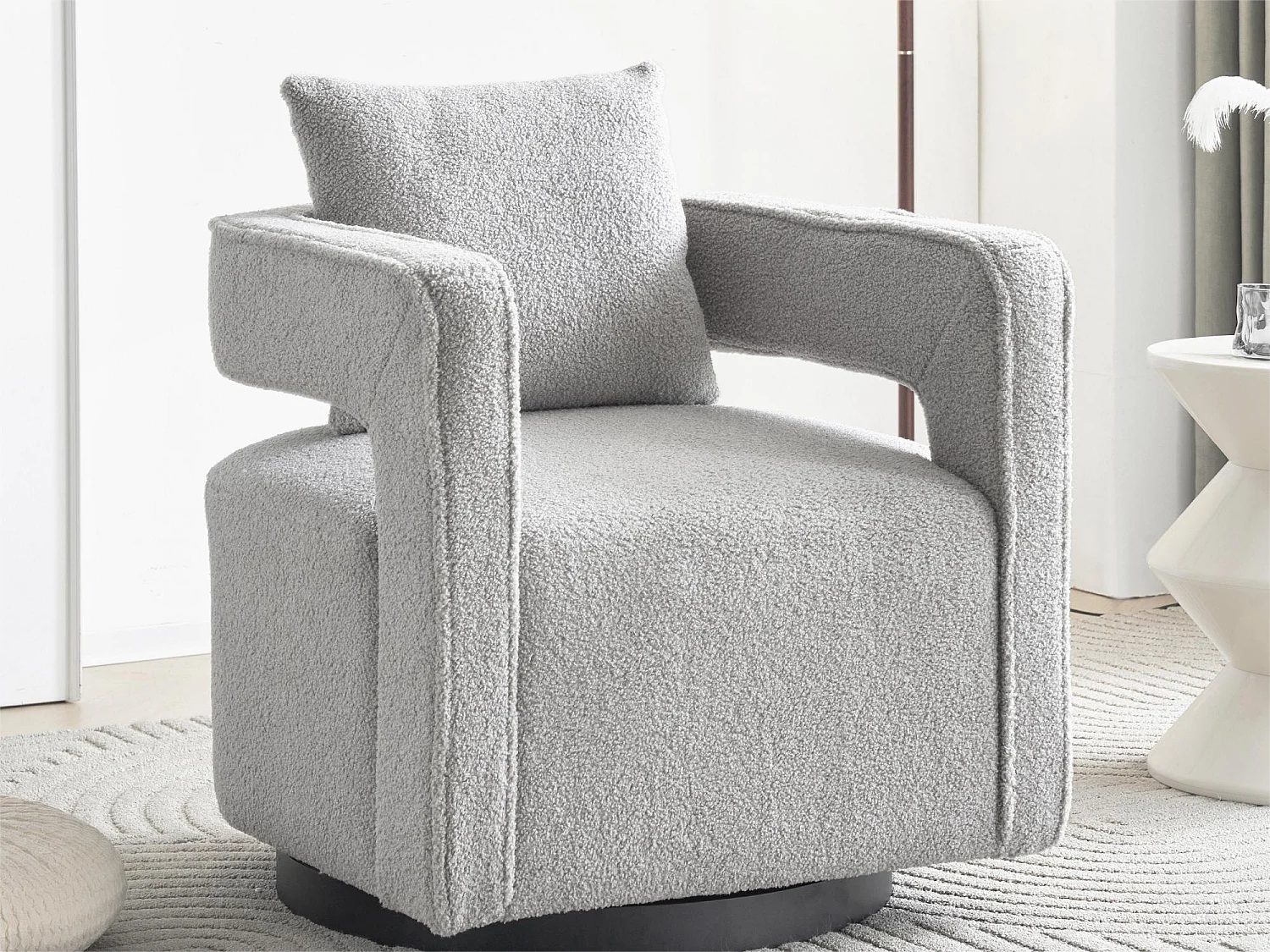 Fauteuil pivotante à 360° en tissu bouclette gris avec coussin