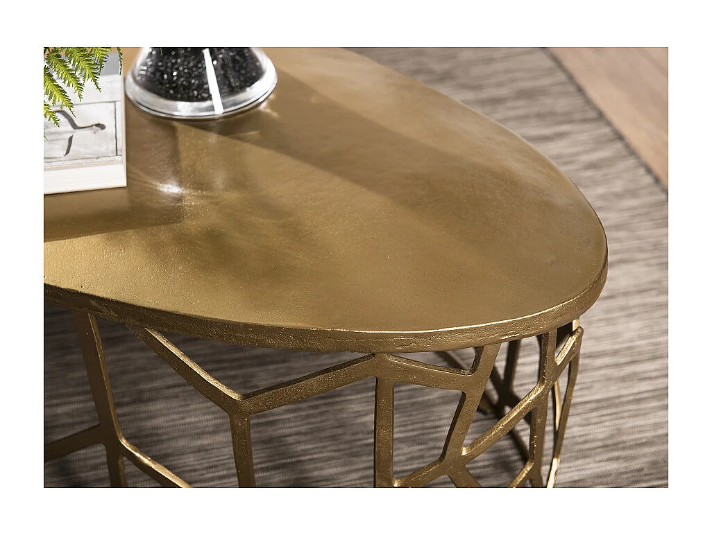 JOHAN - Table basse ovale 150x60cm aluminium doré piètement graphique