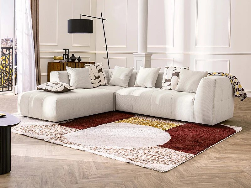 Stor hjørnesofa venstrevendt i beige fløjl med fine ribber NAEMIA fra Maison Céphy