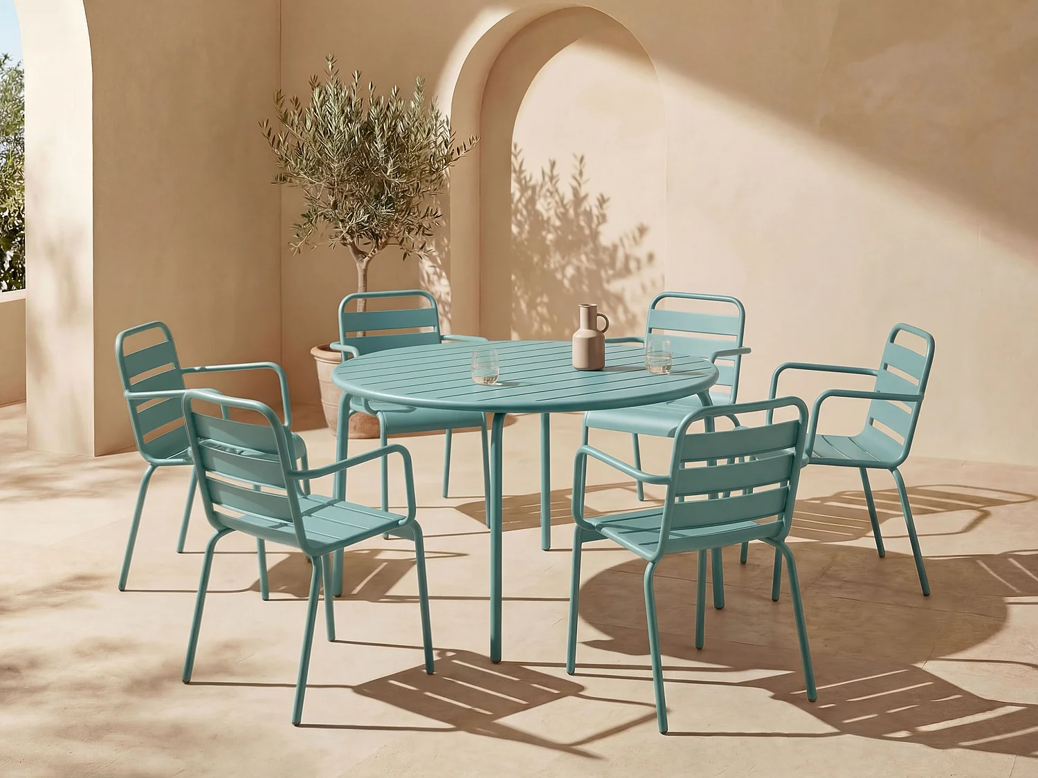 Metal garden dining set - one round table D.130 cm and 6 stackable armchairs - Almond green - MIRMANDE by MYLIA