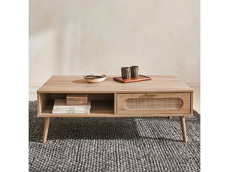 Table basse. Eva.  scandinave en cannage arrondi et en décor bois. 1 tiroir réversible L110 x l59 x H39cm
