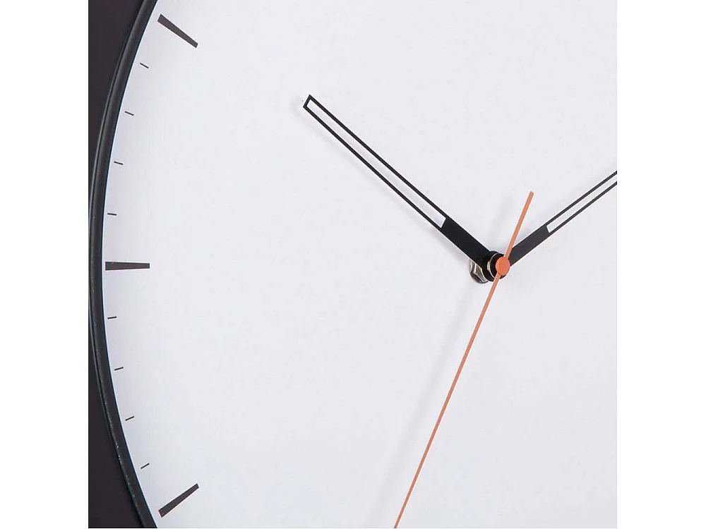 Horloge murale en métal Calm