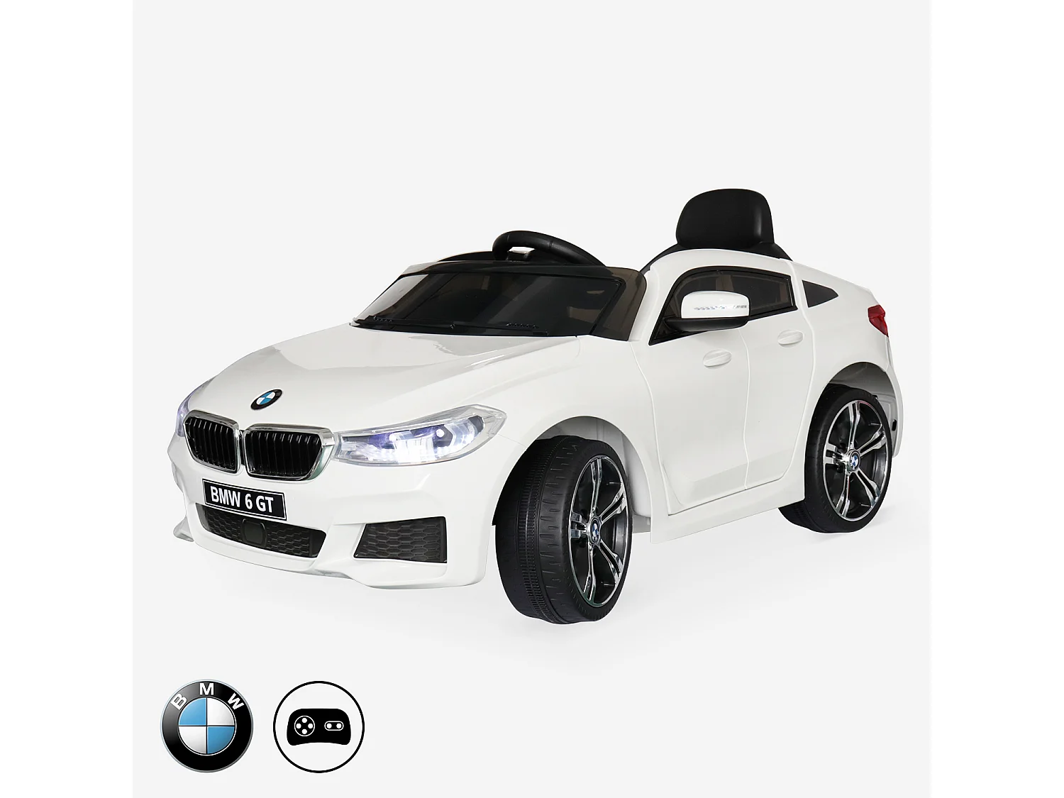 BMW Série 6 GT  blanche. voiture électrique pour enfants 12V 4 Ah. 1 place. avec autoradio et télécommande