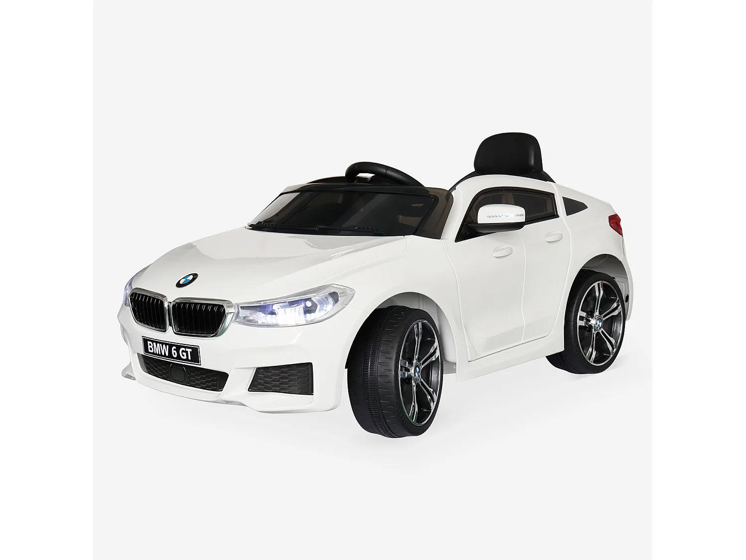 BMW Série 6 GT  blanche. voiture électrique pour enfants 12V 4 Ah. 1 place. avec autoradio et télécommande