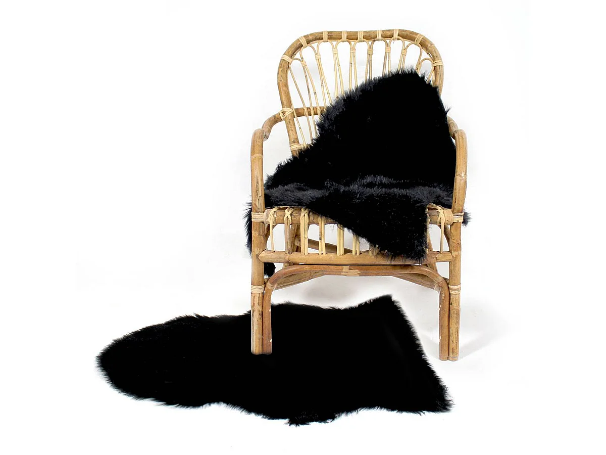 Manta de piel sintética negra suave y hygge para tu hogar