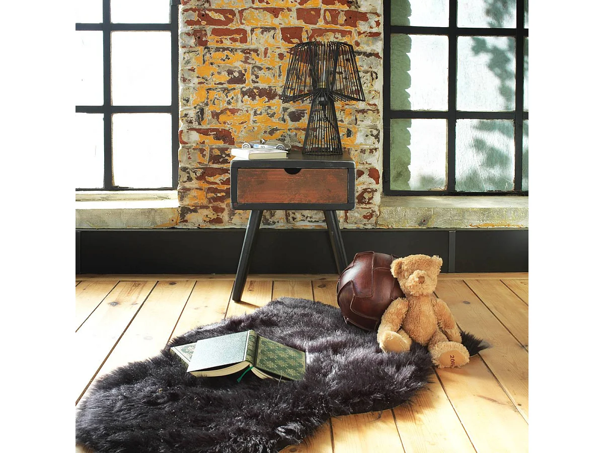 Manta de piel sintética negra suave y hygge para tu hogar