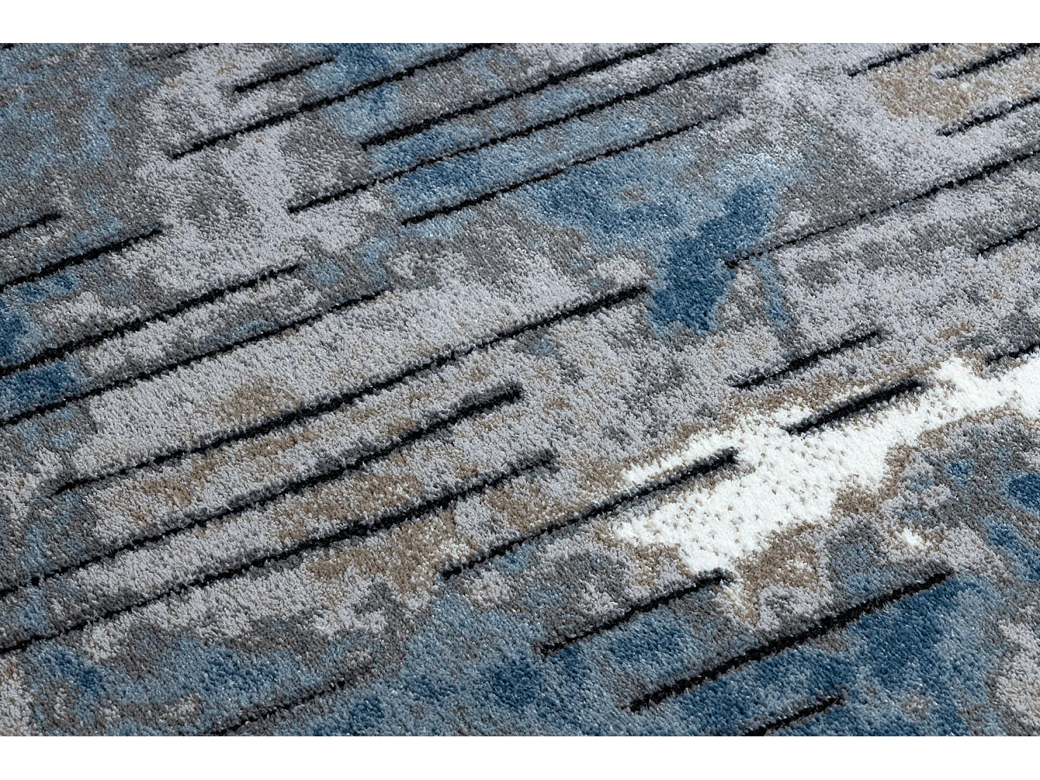 Tapis moderne COZY 8876 Rio - Structural deux niveaux de molleton bleu 140x190 cm