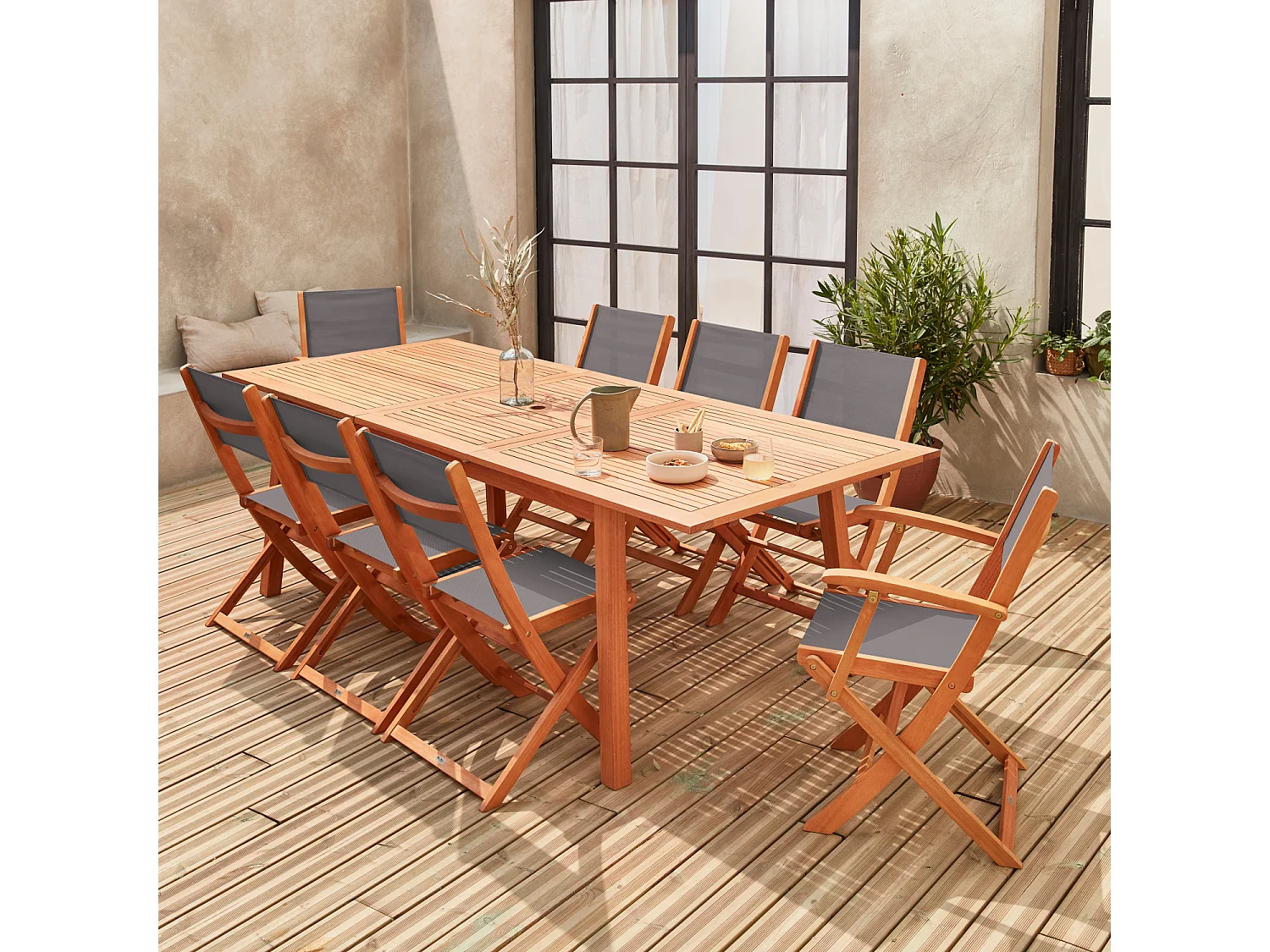 Table de jardin extensible bois d'eucalyptus + 8 assises. en bois d'Eucalyptus huilé et textilène gris anthracite