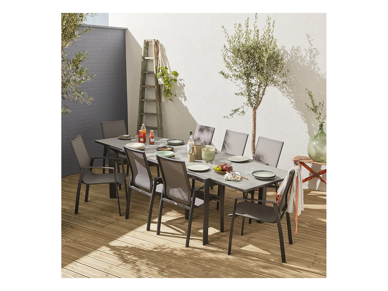 Mesa de jardín extensible de aluminio con 8 sillas gris oscuro