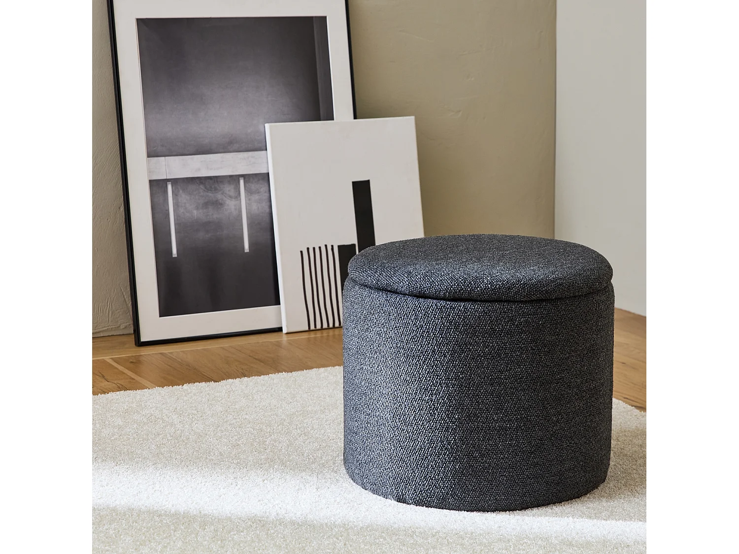 Pouf gris en tissu avec rangement pour coussins ou plaids