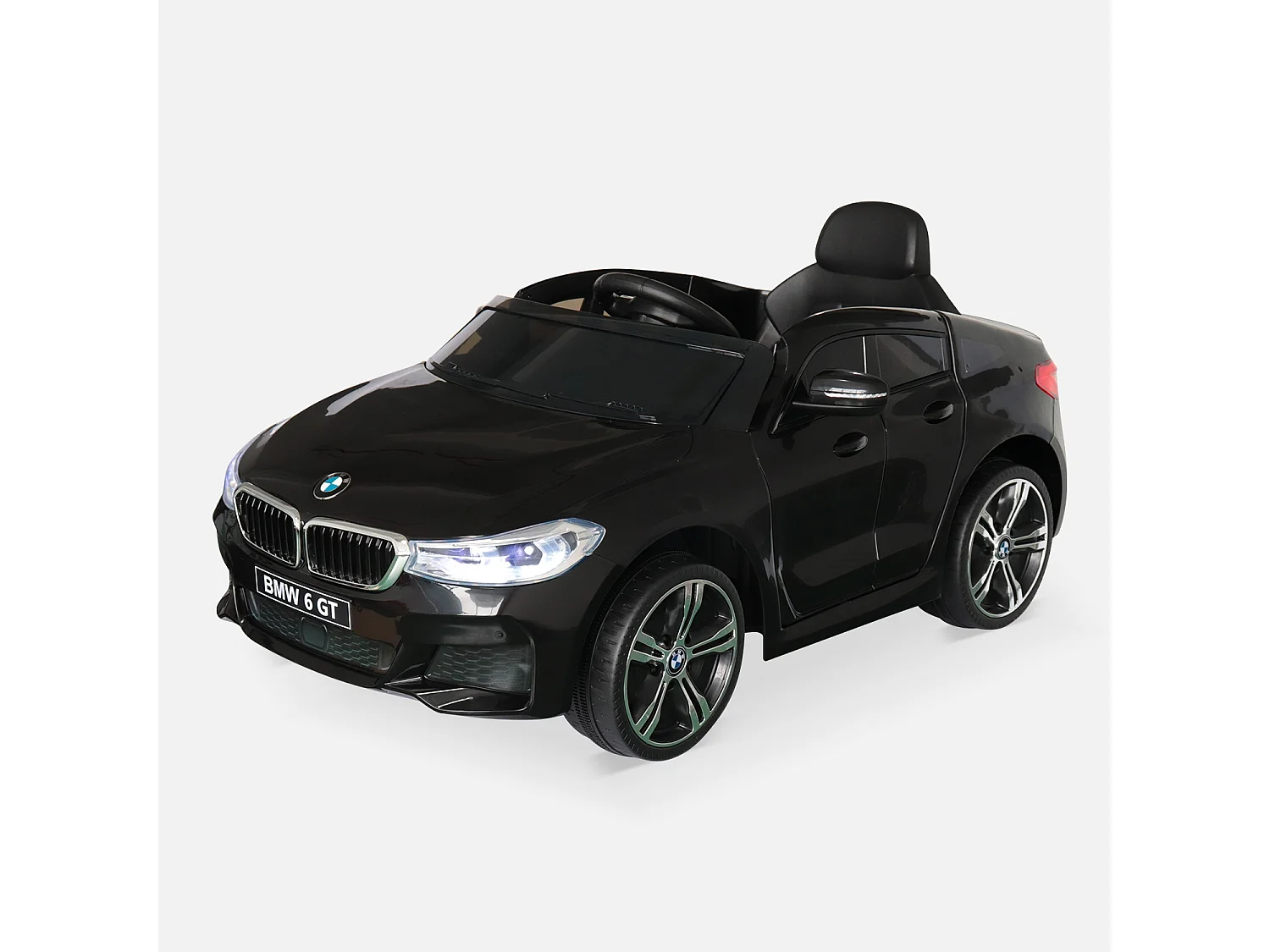 BMW Série 6 GT noire. voiture électrique pour enfants 12V 4 Ah. 1 place. avec autoradio et télécommande
