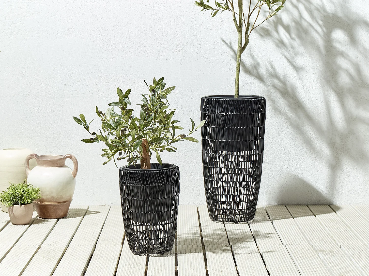 Set van 2 bloempotten CHELONE PE rotan 26/34 cm Zwart