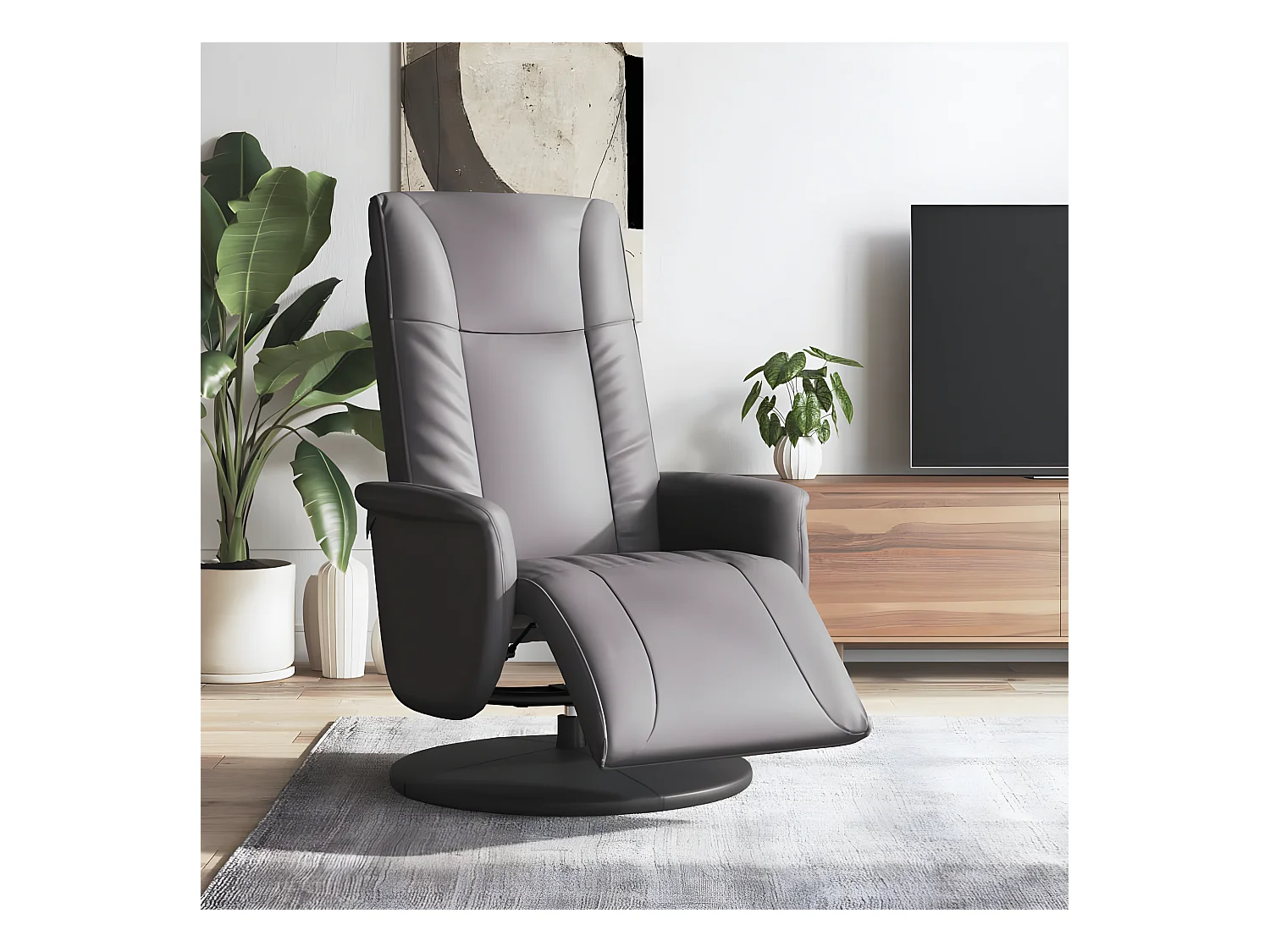 Sillón reclinable con reposapiés de piel sintética gris.