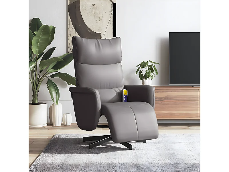 Sillón de masaje reclinable con reposapiés de piel sintética gris.
