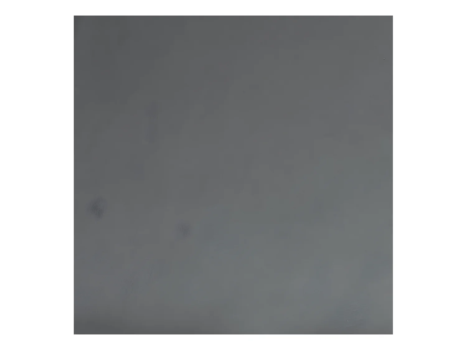 Poltrona reclinável em couro sintético cinza com apoio para pés