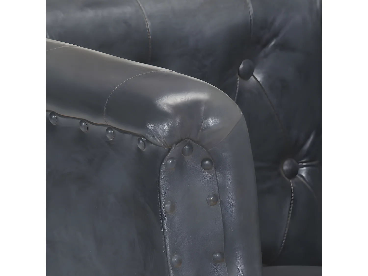 Poltrona grigia in vera pelle