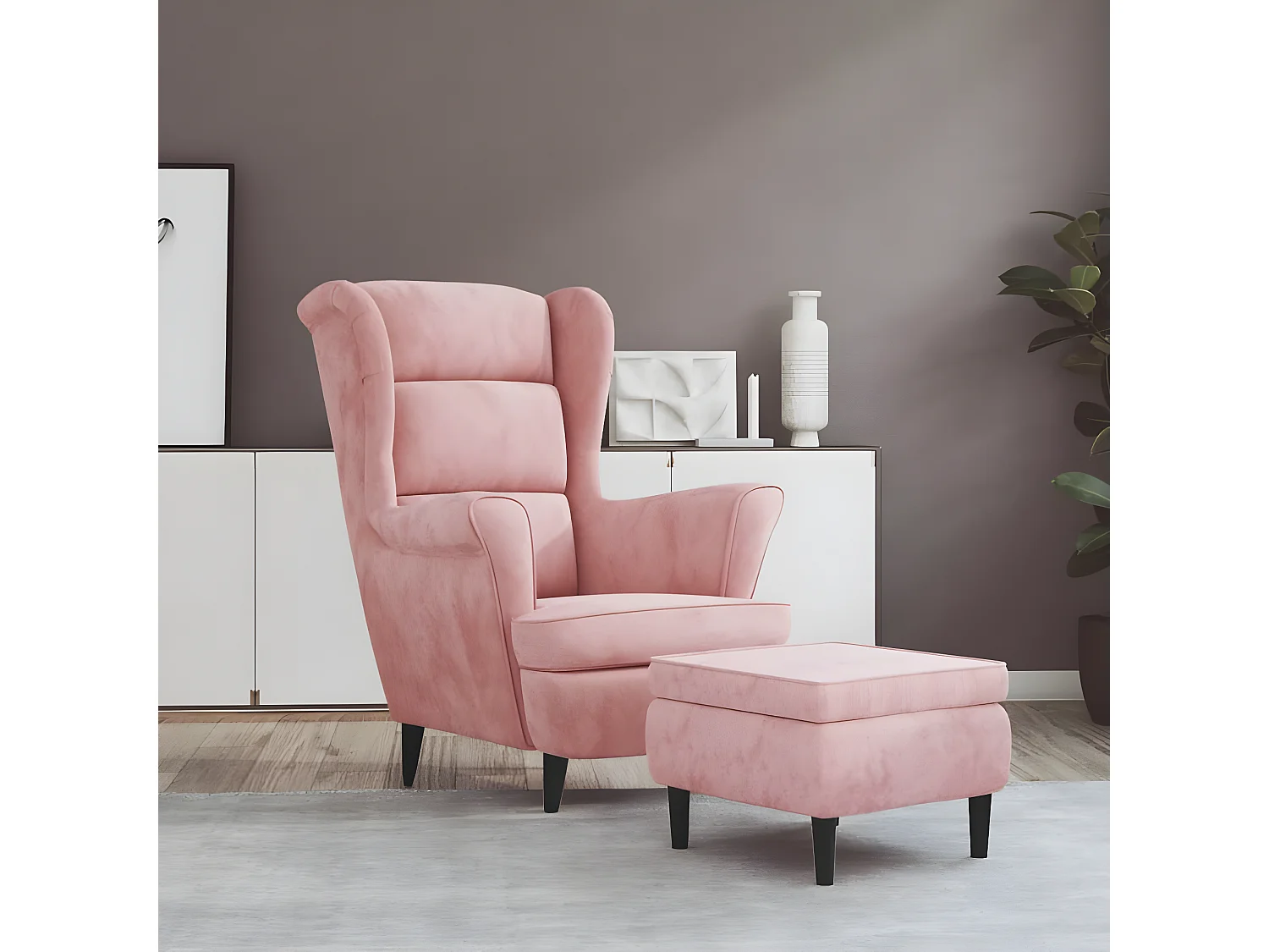 Gevleugelde fauteuil met fluwelen roze kruk