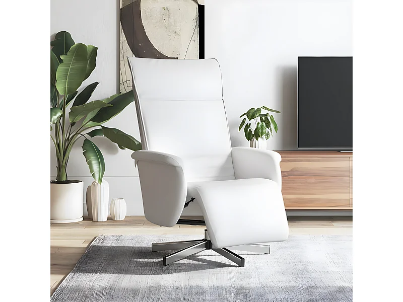Sillón reclinable con reposapiés de piel sintética blanca.
