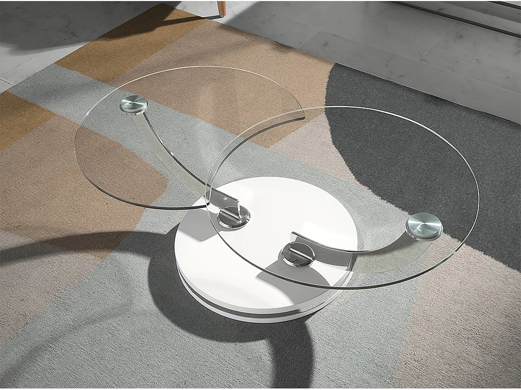 Mesa de café com tampos fixos de vidro temperado com braços giratórios curvos em aço. 2011