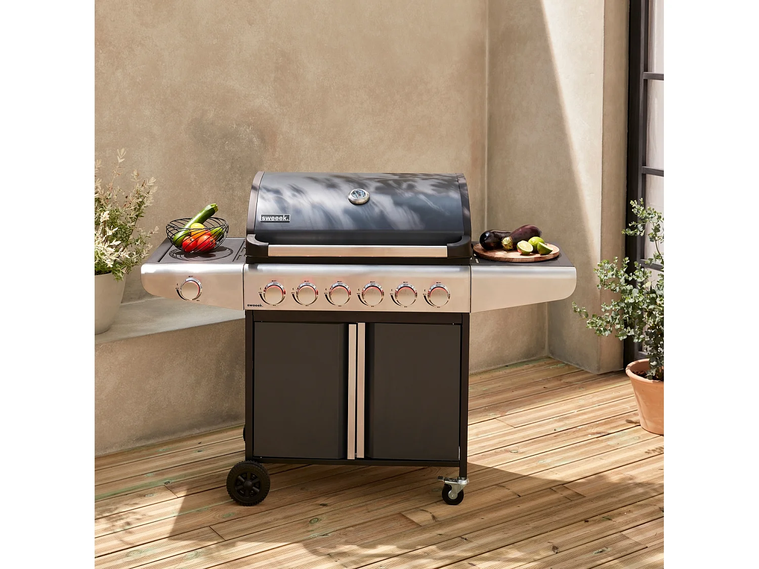 Barbecue a gas con 7 bruciatori di cui 1 laterale, nero