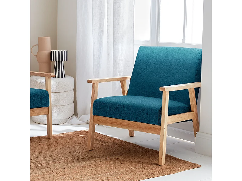 Sillón estilo escandinavo de madera y tela azul esmeralda