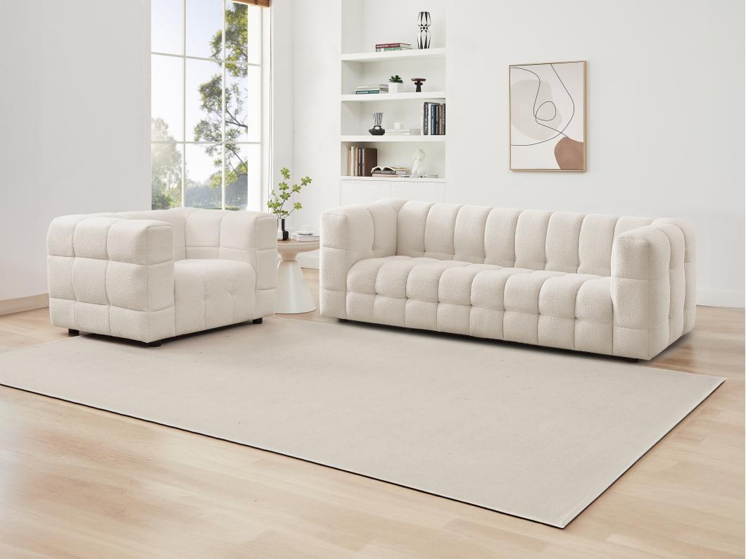 Canapé 3 places et fauteuil en tissu bouclette blanc ivoire LERICI de Pascal Morabito