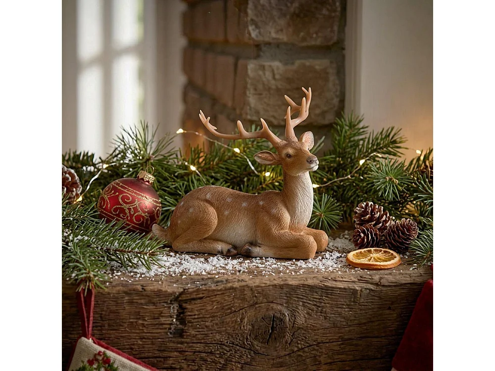 Cerf couché en résine