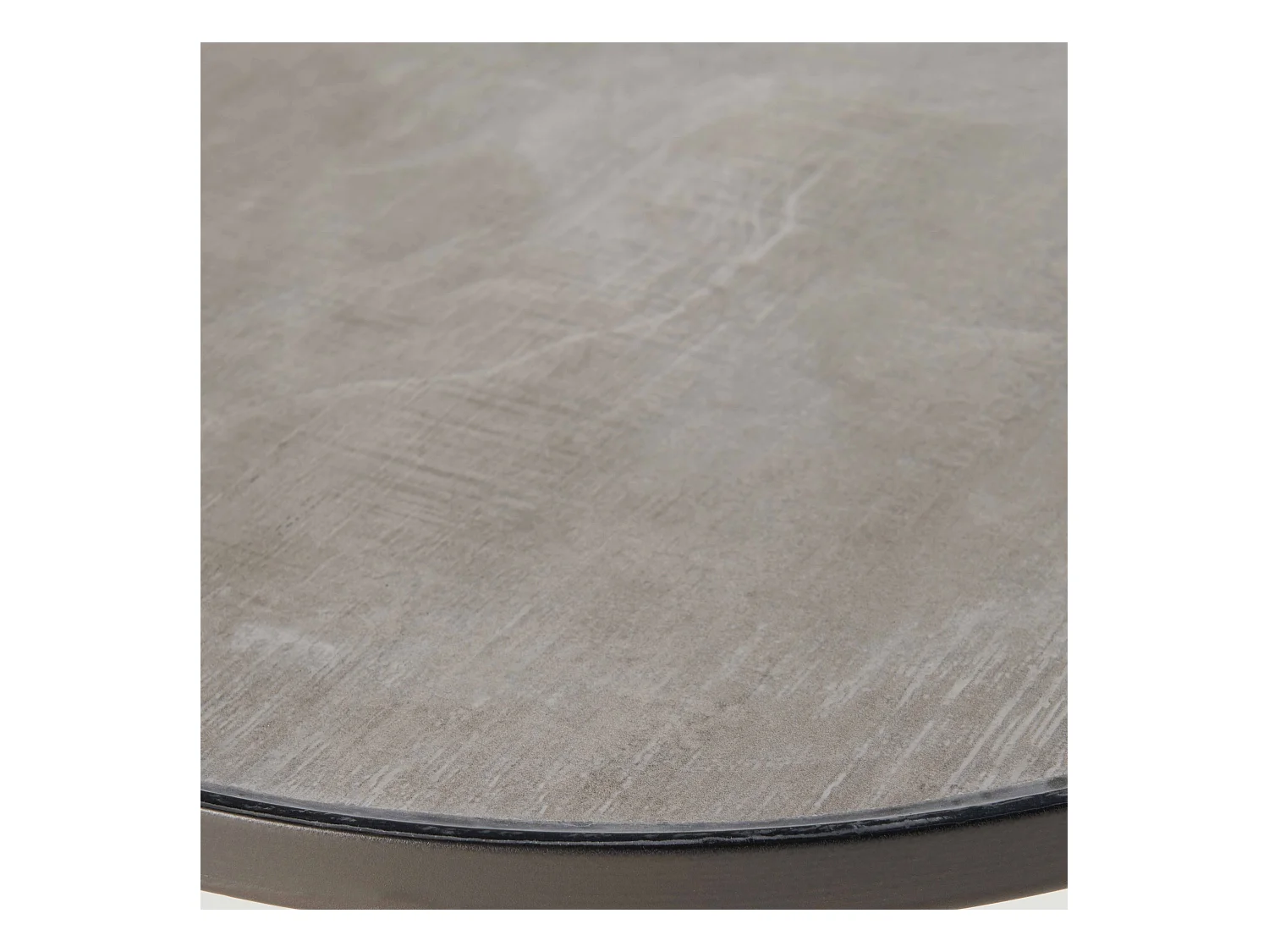 Mesa de centro redonda con efecto de hormigón en la superficie