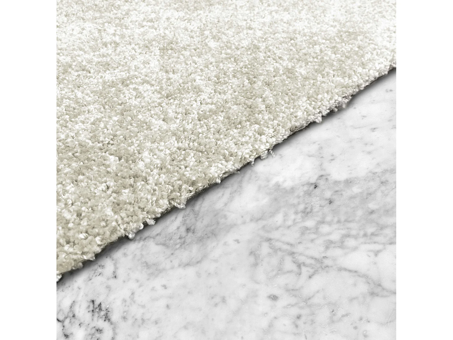 Tapis uni à poils longs en polypropylène 160 x 230 cm crème