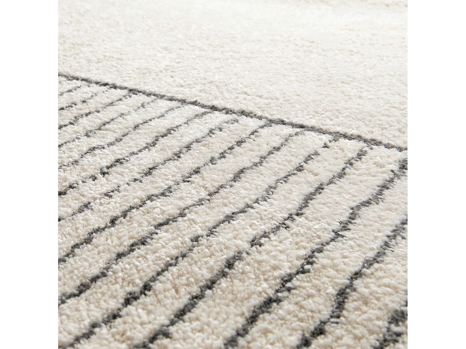 Tapis rectangulaire motif linéaire à poils courts beige 120 x 170 cm