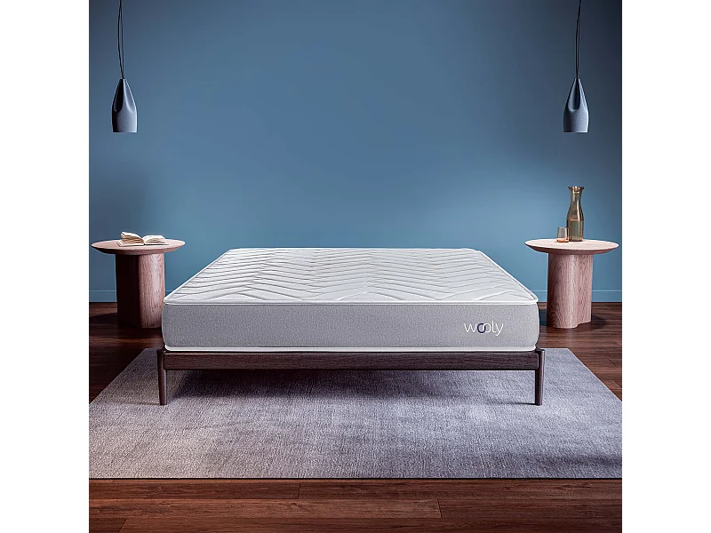 Matelas Wooly One SP 140x190 cm - Hybride - Ressorts Ensachés - Mémoire de Forme - Mousse HR 35 kg - Latex - Confort mi - Ferme - Réversible - 24 cm