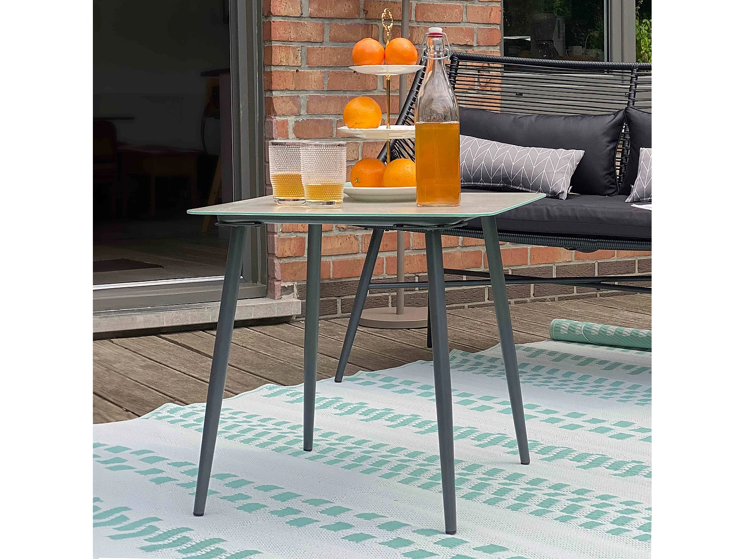 Grande table basse de jardin en acier gris