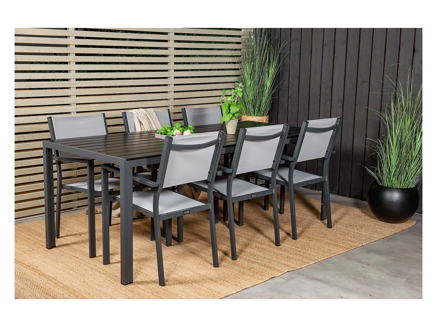 Break tuinmeubelset tafel 90x205cm zwart, 6 stoelen Copacabana grijs.