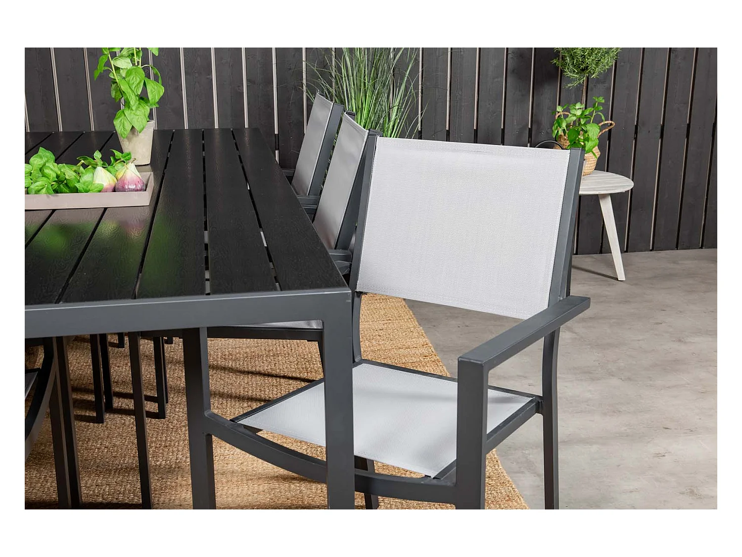 Break tuinmeubelset tafel 90x205cm zwart, 6 stoelen Copacabana grijs.