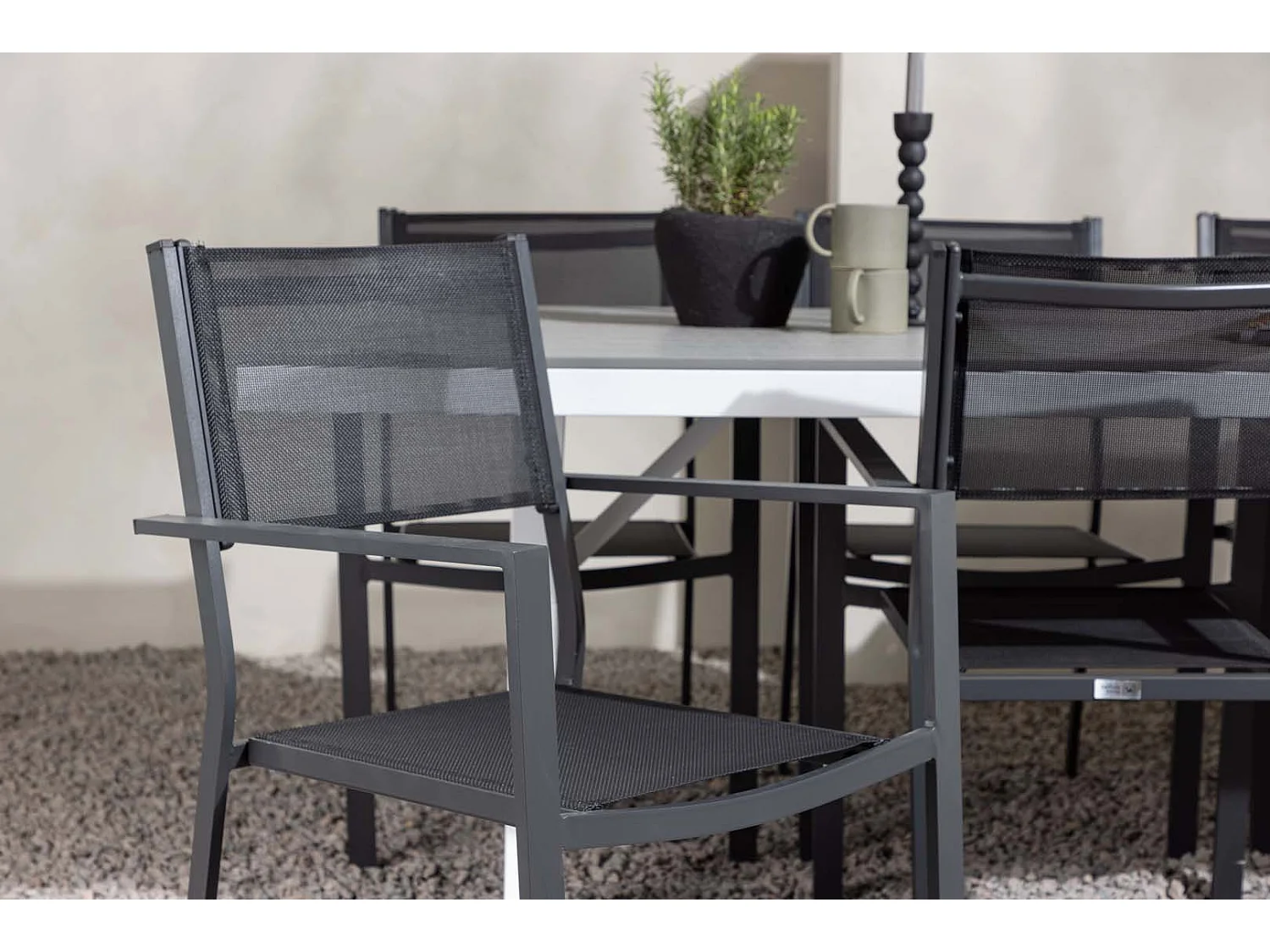 Garcia set de jardin table 100x200cm gris, 6 chaises Copacabana noir.
