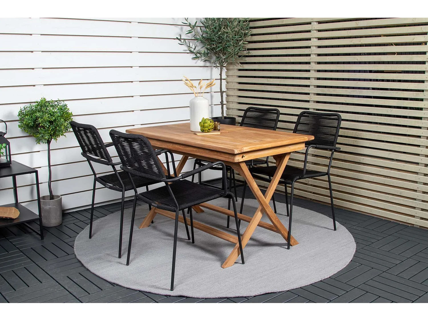 Kenya Gartenset Tisch 70x120cm natur, 4 Stühle Lindos schwarz.