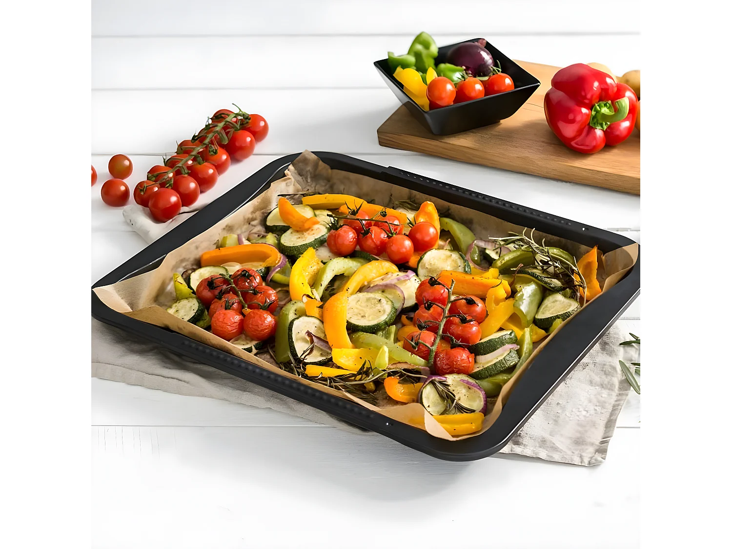 Plaque de four extensible de 35-52 x 32 cm et 7 emporte-pièces de Noël en inox Zenker Noël